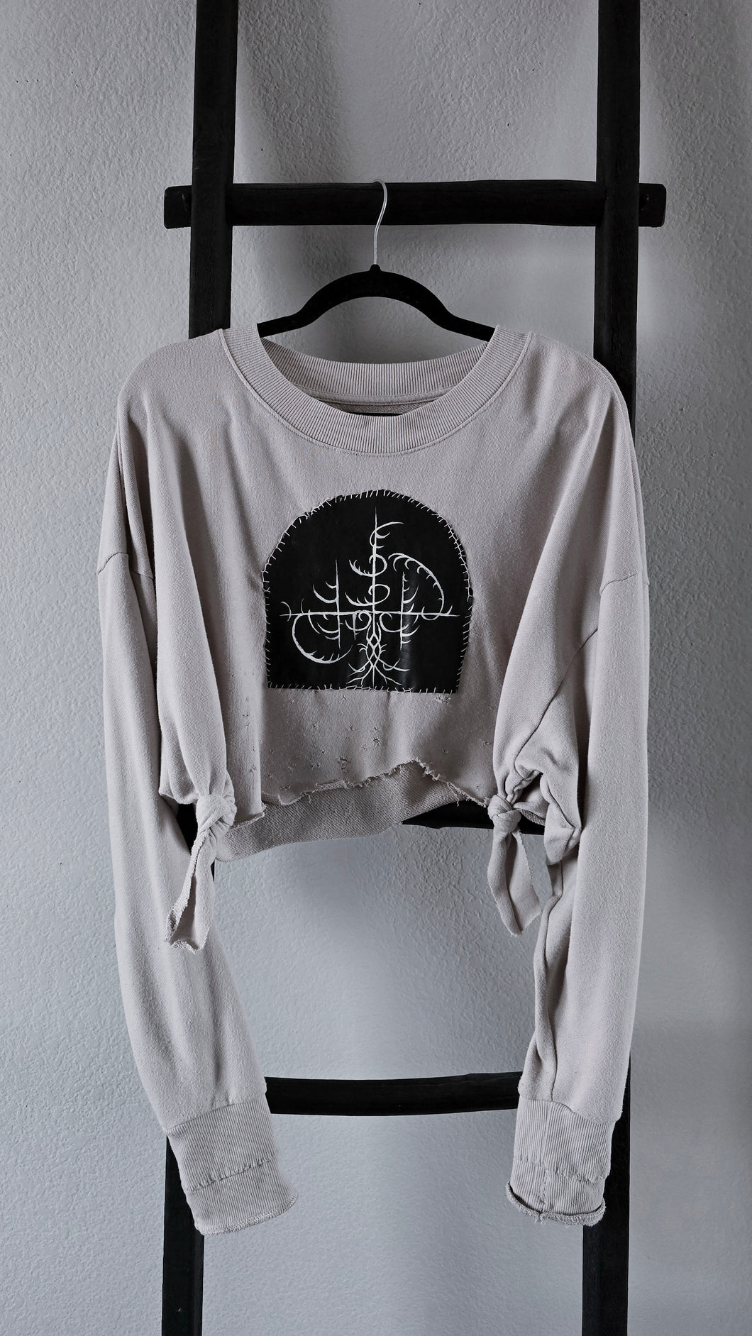Moth-bitten crop sweater