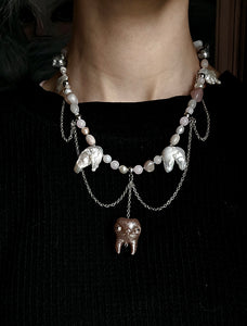 Tooth and Freshwater Pearls